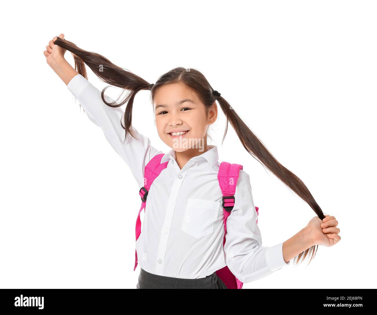 Happy little schoolgirl on white background Stock Photo - Alamy