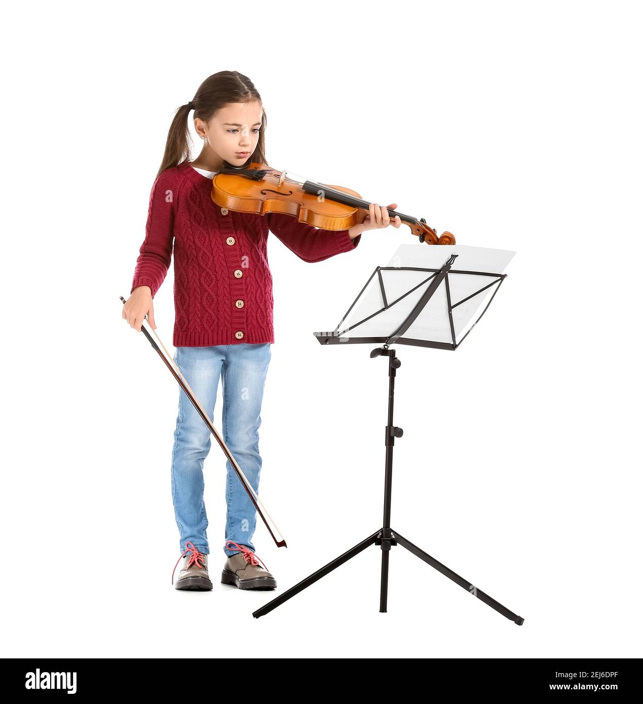 Little girl playing violin on white background Stock Photo - Alamy
