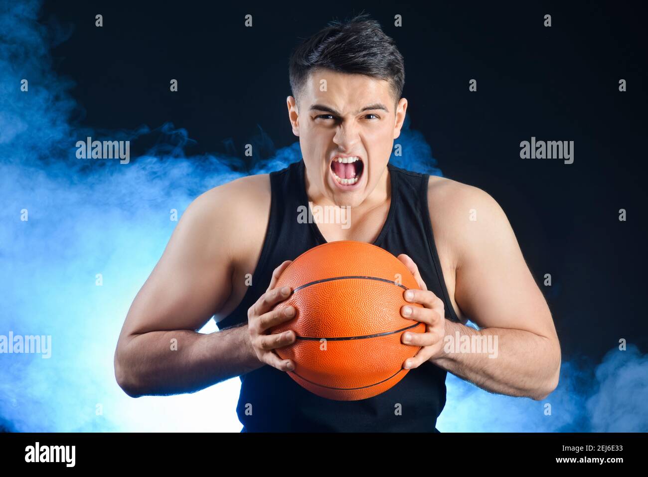aggressive-male-basketball-player-on-dark-background-stock-photo-alamy