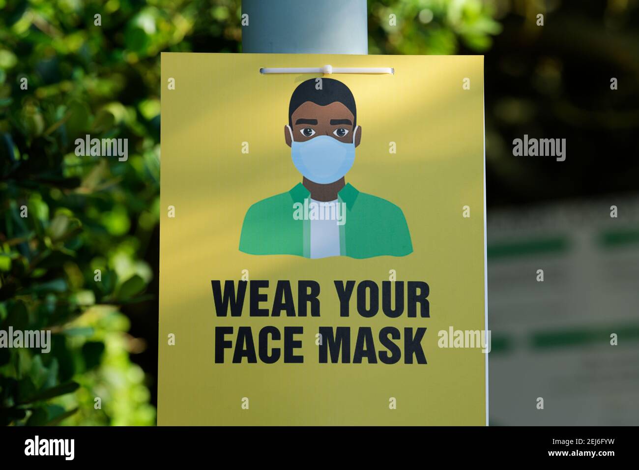 Sign, Covid 19, Corona virus infection, mask, personal protection equipment, outdoor advertising, Durban, South Africa, public awareness, epidemic Stock Photo