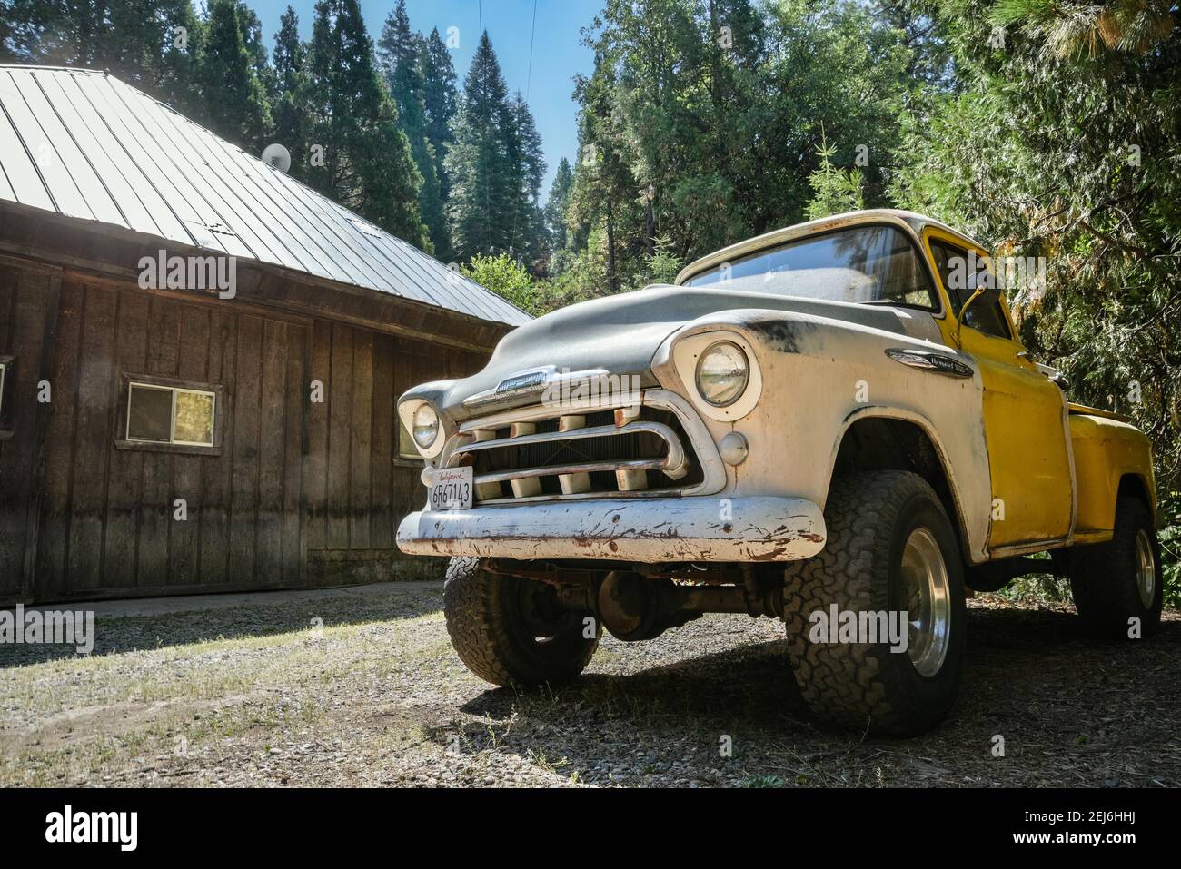 An old truck next to a wood cabin in Yosemite national park Stock Photo ...