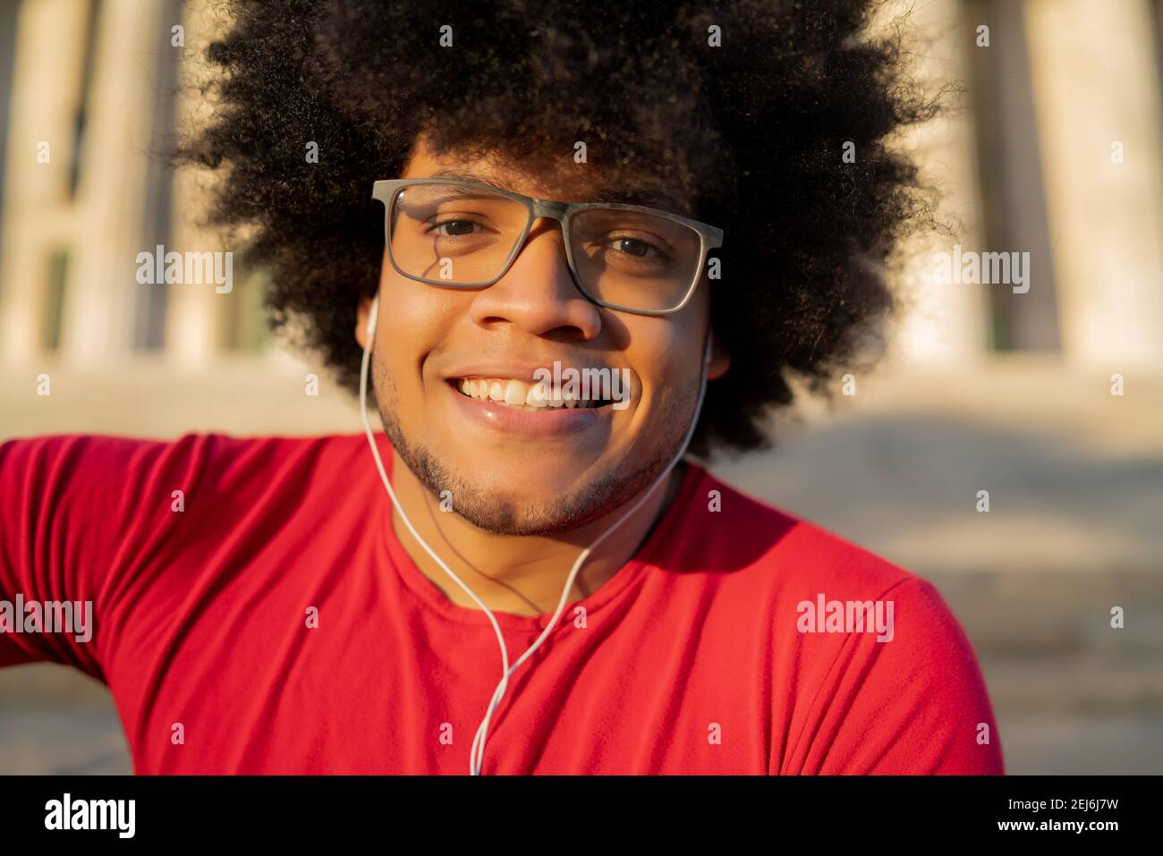 Portrait of young latin man outdoors. Stock Photo
