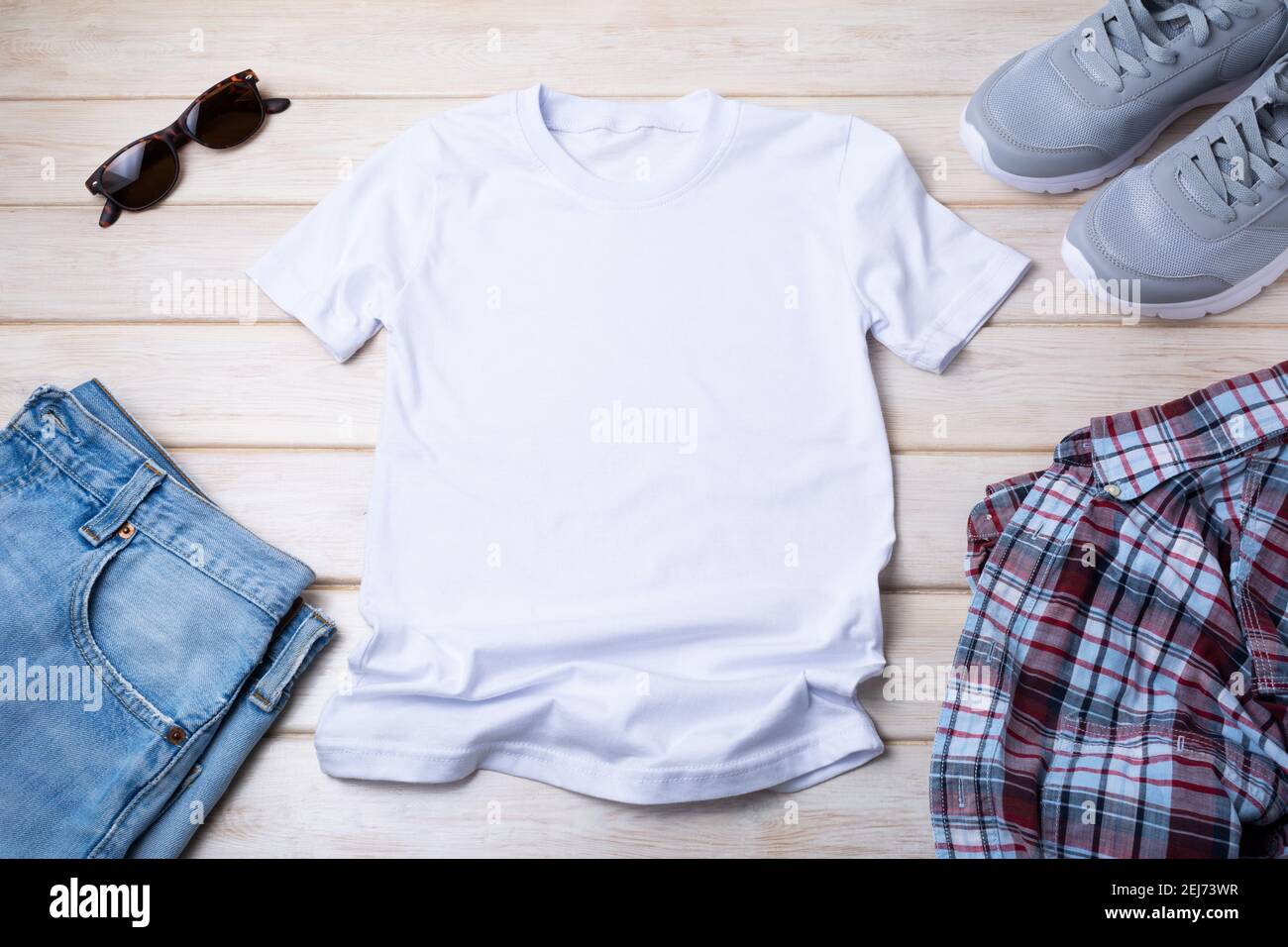 White men’s cotton Tshirt mockup with sunglasses, gray running shoes