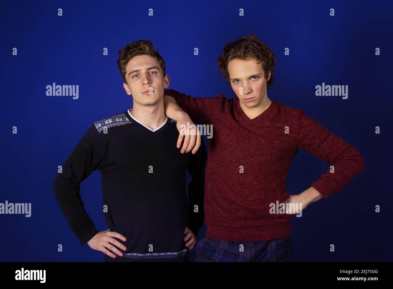 Study and work. Two young attractive students with laptops. Stock Photo