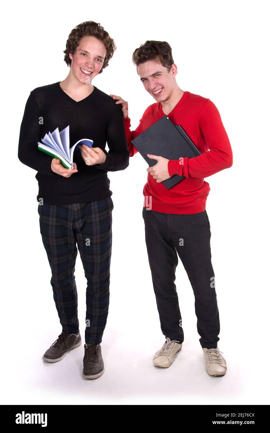 Study and work. Two young attractive students with laptops. Stock Photo