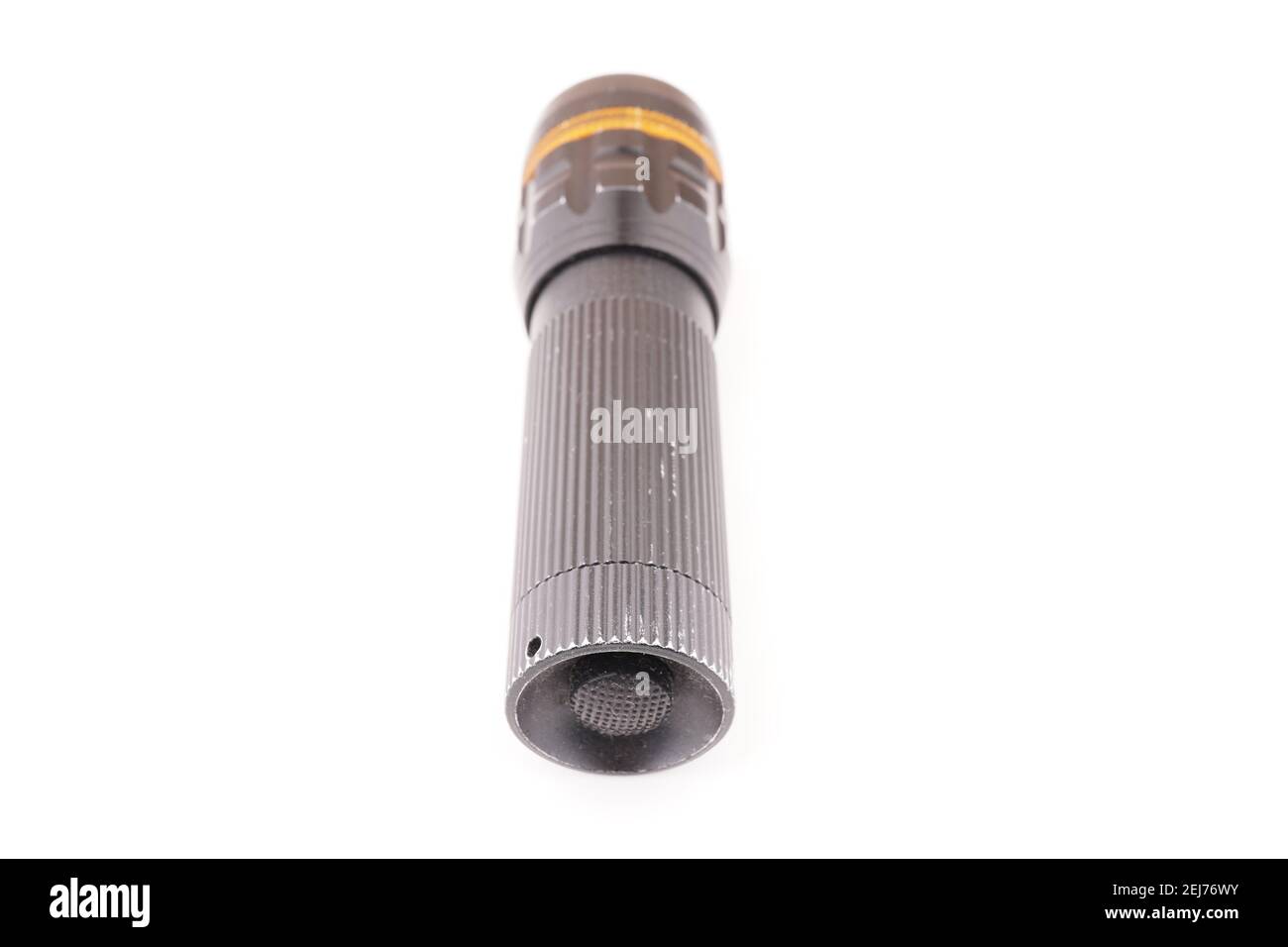 black metal flashlight on a white background Stock Photo