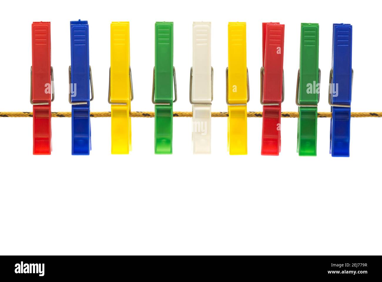 Colorful cloth pegs on white background Stock Photo