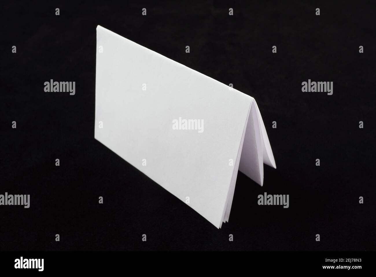 white sheet of paper on a black background Stock Photo - Alamy