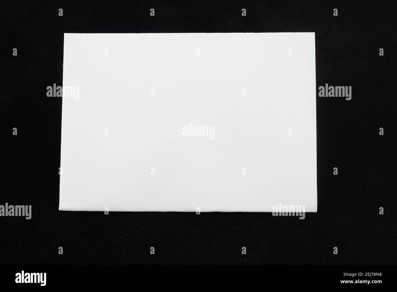 white sheet of paper on a black background Stock Photo - Alamy