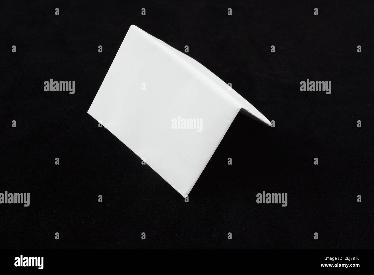 white sheet of paper on a black background Stock Photo - Alamy