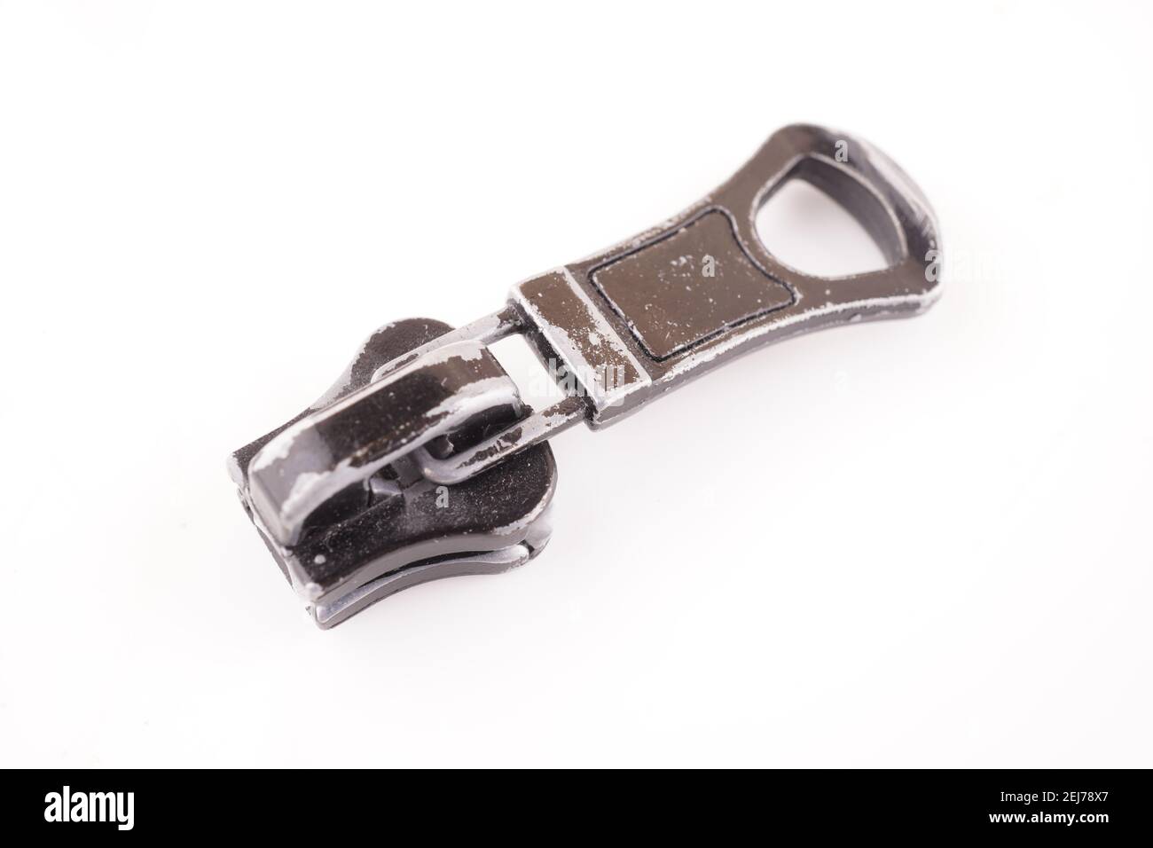 zipper slider on white background Stock Photo