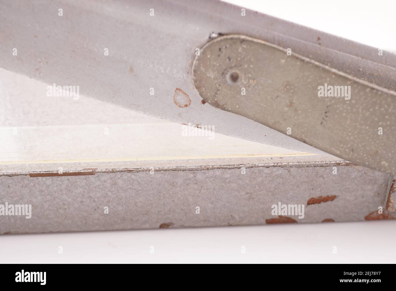 paper cutter on white background Stock Photo - Alamy