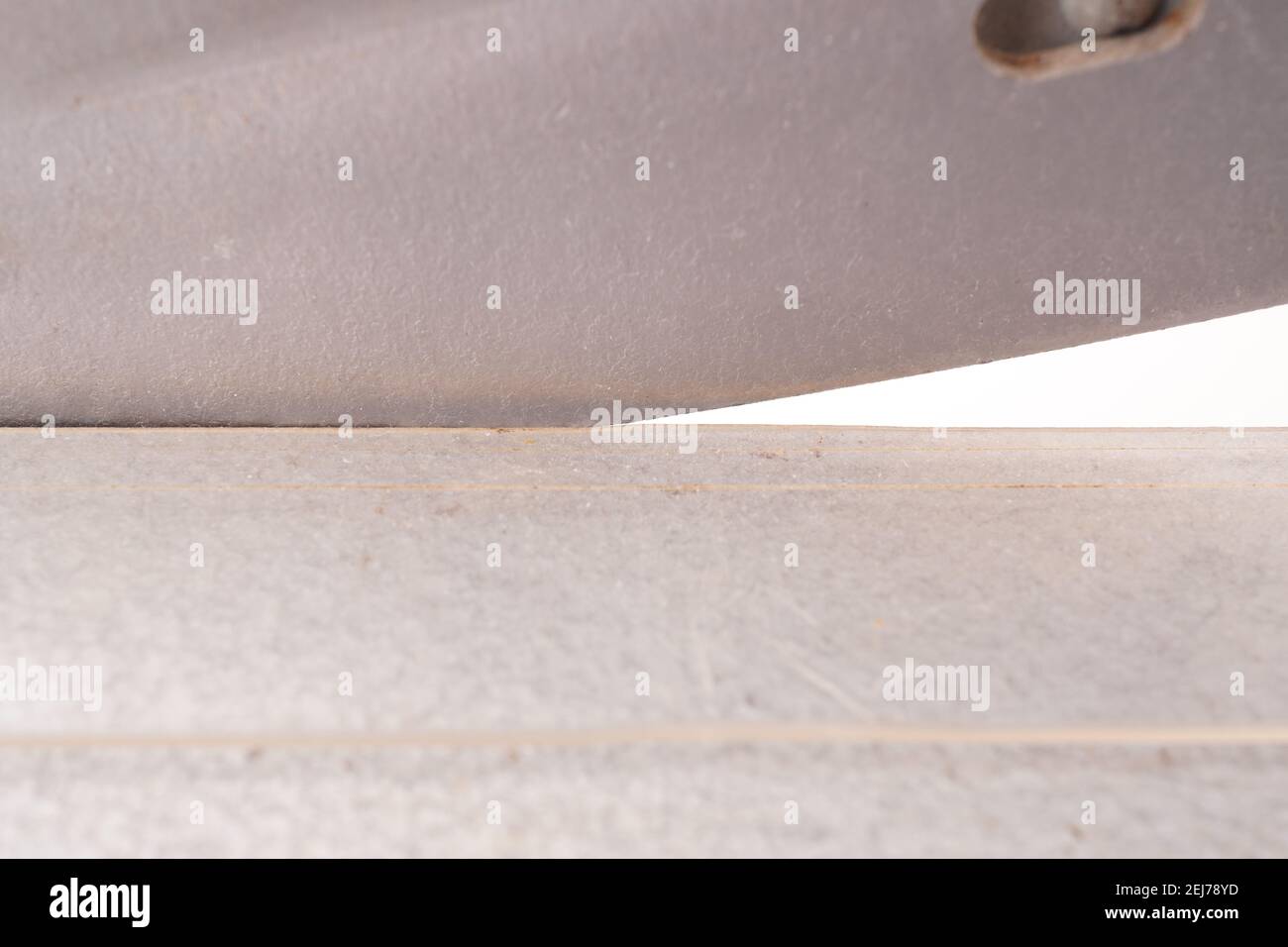 paper cutter on white background Stock Photo - Alamy