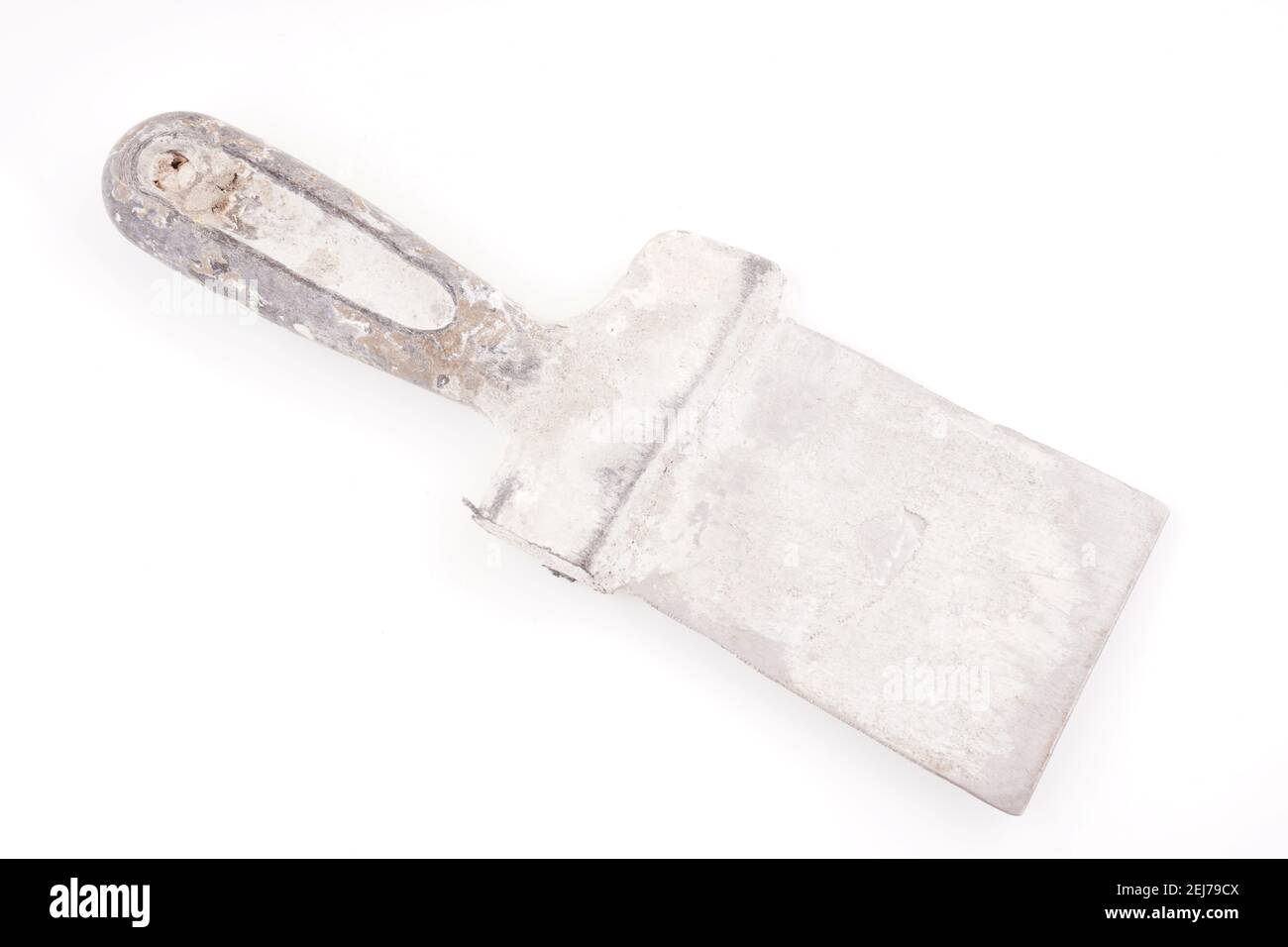 dirty spatula for putty on a white background Stock Photo