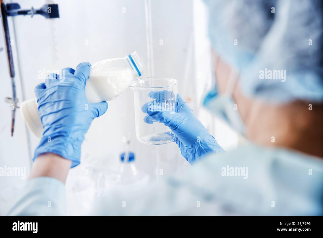 Quality control test of milk in laboratory. Dairy factory industry