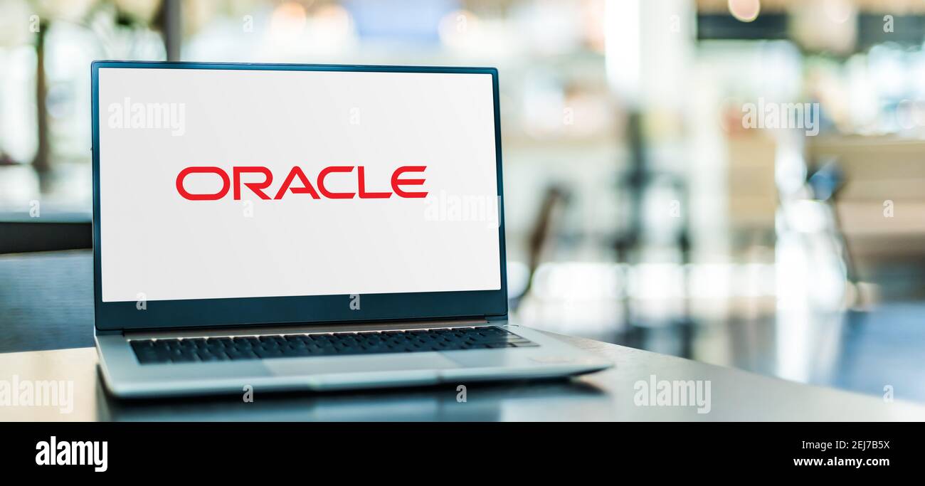 POZNAN, POL - SEP 23, 2020: Laptop computer displaying logo of Oracle Corporation, an American computer technology corporation headquartered in Redwoo Stock Photo