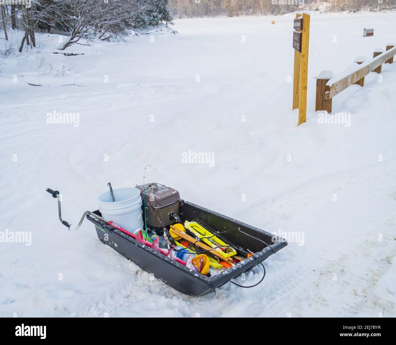 sled with ice fishing gear Stock Photo Alamy
