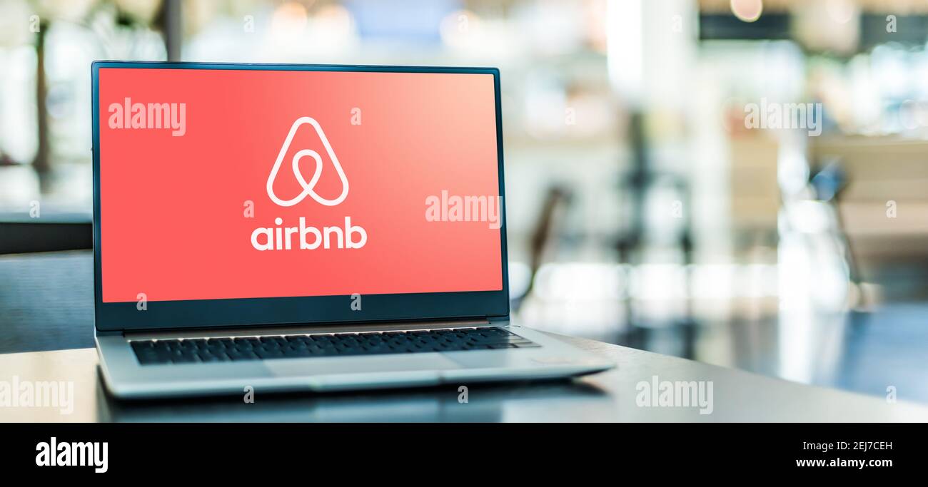 POZNAN, POL - SEP 23, 2020: Laptop computer displaying logo of Airbnb, an American vacation rental online marketplace company based in San Francisco, Stock Photo