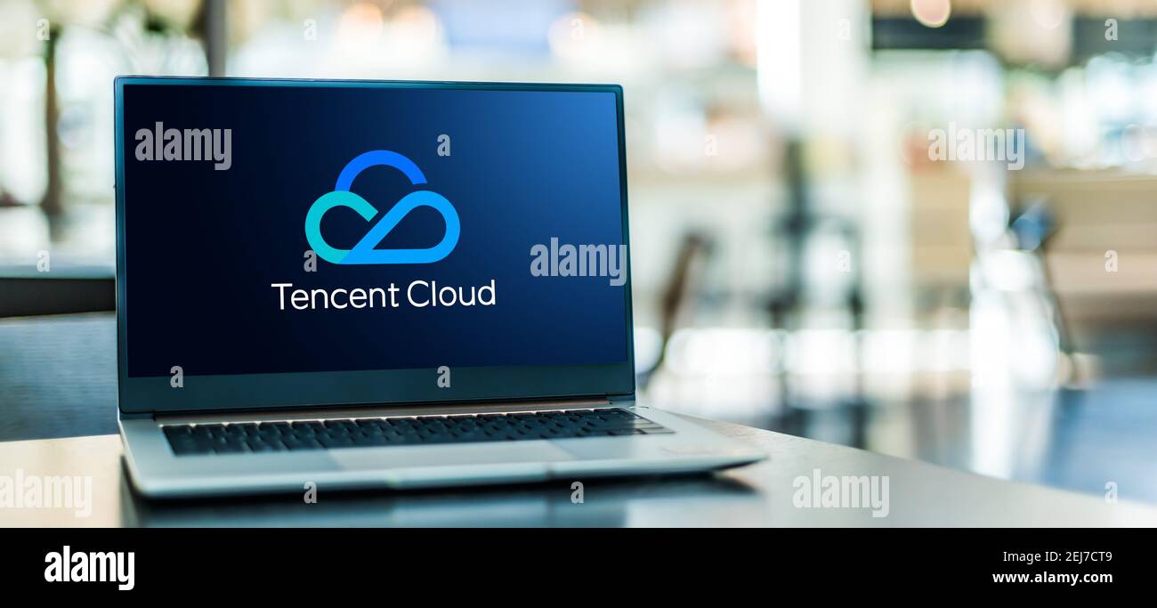 POZNAN, POL - SEP 23, 2020: Laptop computer displaying logo of Tencent Cloud, high-performance cloud compute service provided by Tencent, Stock Photo