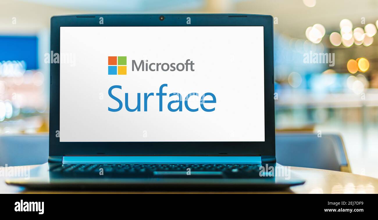 POZNAN, POL - SEP 23, 2020: Laptop computer displaying logo of Microsoft Surface, a series of touchscreen-based personal computers and interactive whi Stock Photo