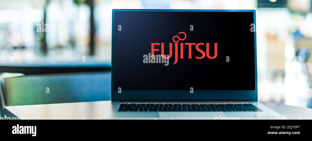 POZNAN, POL - SEP 23, 2020: Laptop computer displaying logo of Fujitsu, a Japanese multinational information technology equipment and services company Stock Photo