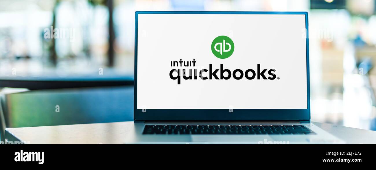 POZNAN, POL - SEP 23, 2020: Laptop computer displaying logo of QuickBooks, an accounting software package developed and marketed by Intuit Stock Photo