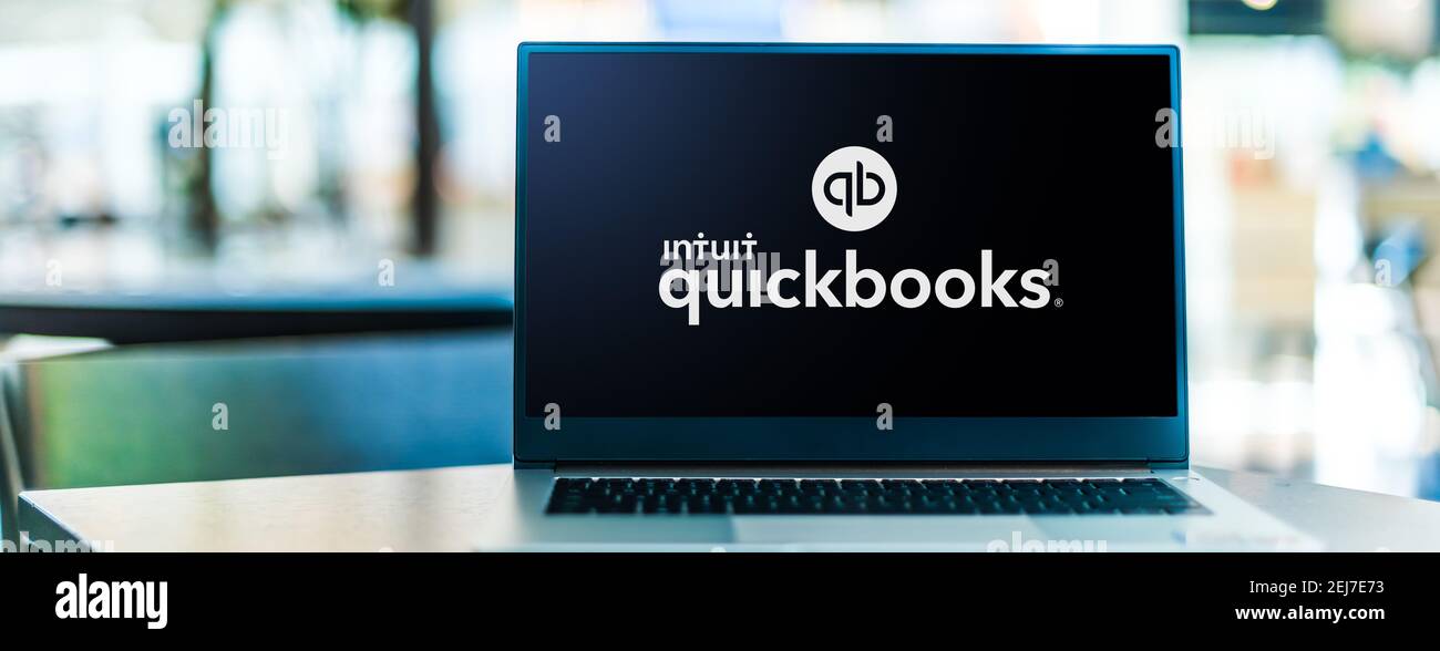 POZNAN, POL - SEP 23, 2020: Laptop computer displaying logo of QuickBooks, an accounting software package developed and marketed by Intuit Stock Photo