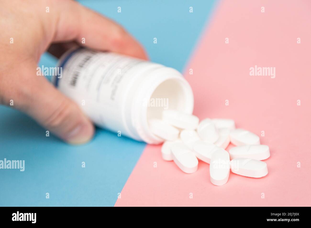 bottle with medicine pills on a colorful background Stock Photo