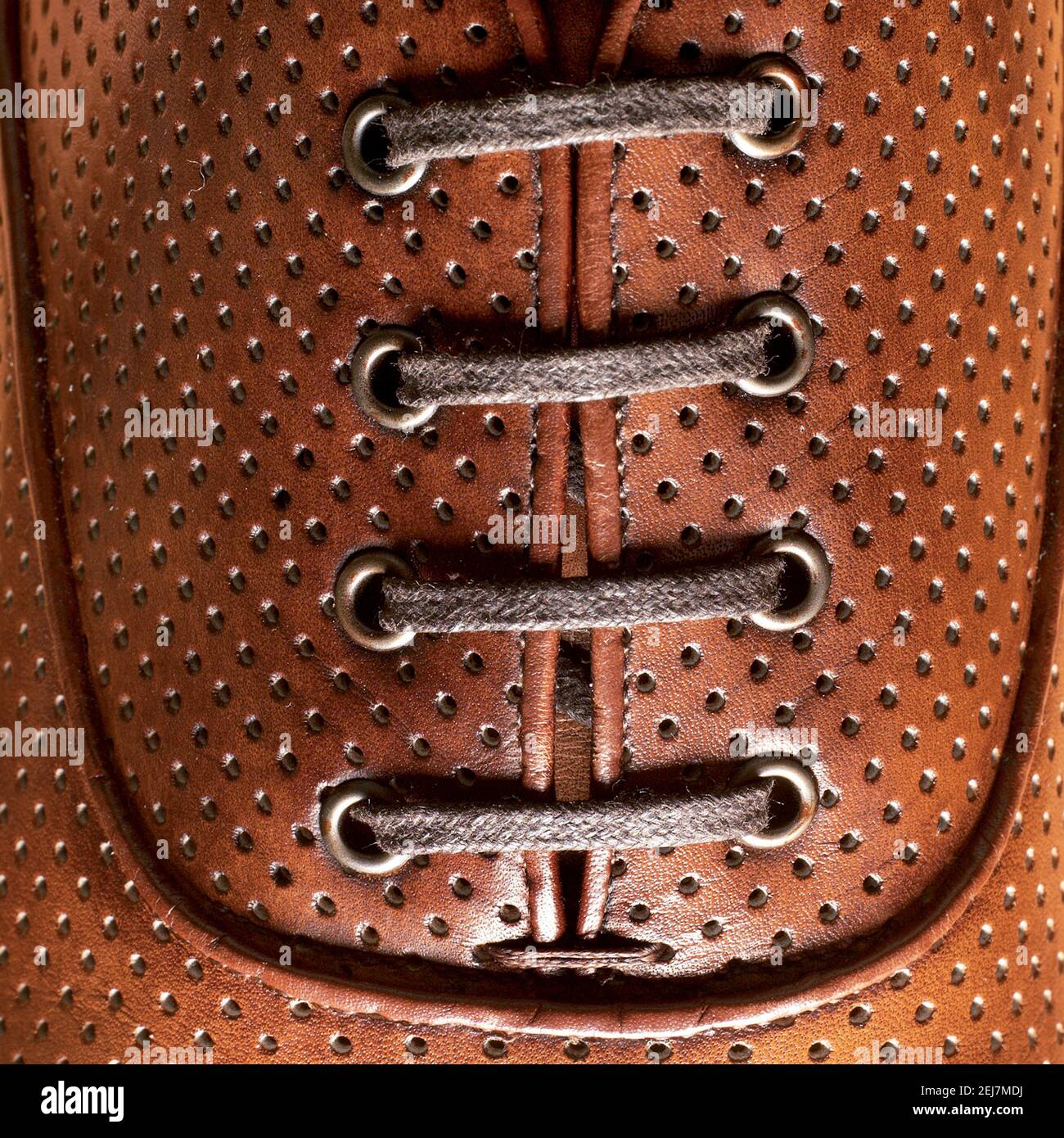 Hand-built leather men's shoe close-up detailed studio shot. Stock Photo