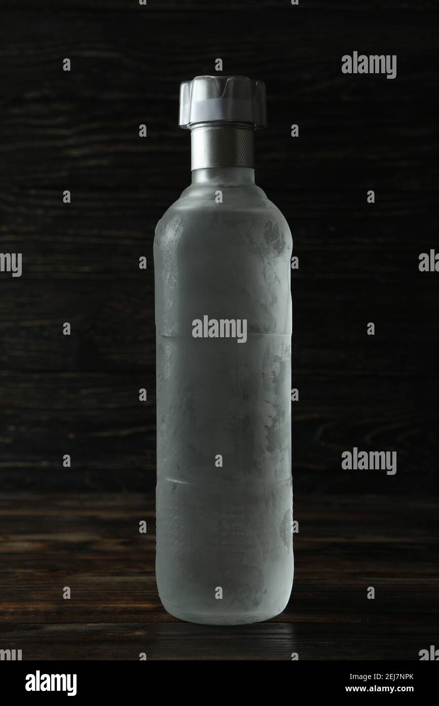 Blank bottle of vodka on wooden background Stock Photo Alamy