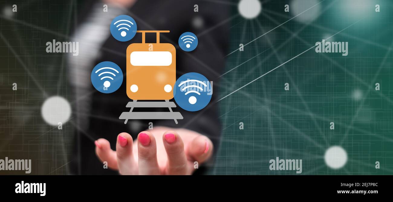 Smart train concept above the hand of a woman in background Stock Photo ...