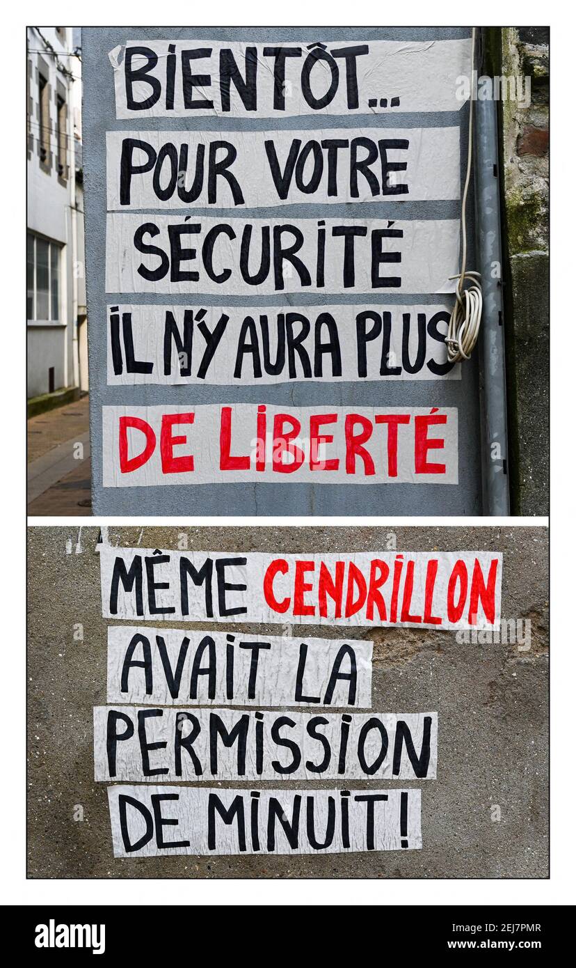 Tags and collages on the walls of the city showing the exasperation and fed up with the sanitary measures and restrictions linked to covid-19. Collage of two messages: 'soon for your safety there will be no more freedom' and 'even Cinderella had the permission of midnight' Granville, France on February 20, 2021. Photo Desfoux JY/ANDBZ/ABACAPRESS.COM Stock Photo