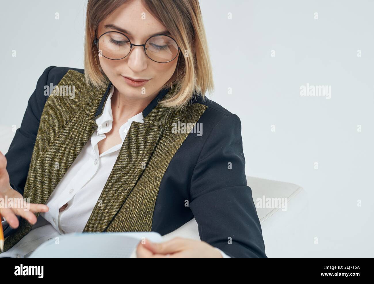 Woman In a bright room suit model business documents Stock Photo - Alamy