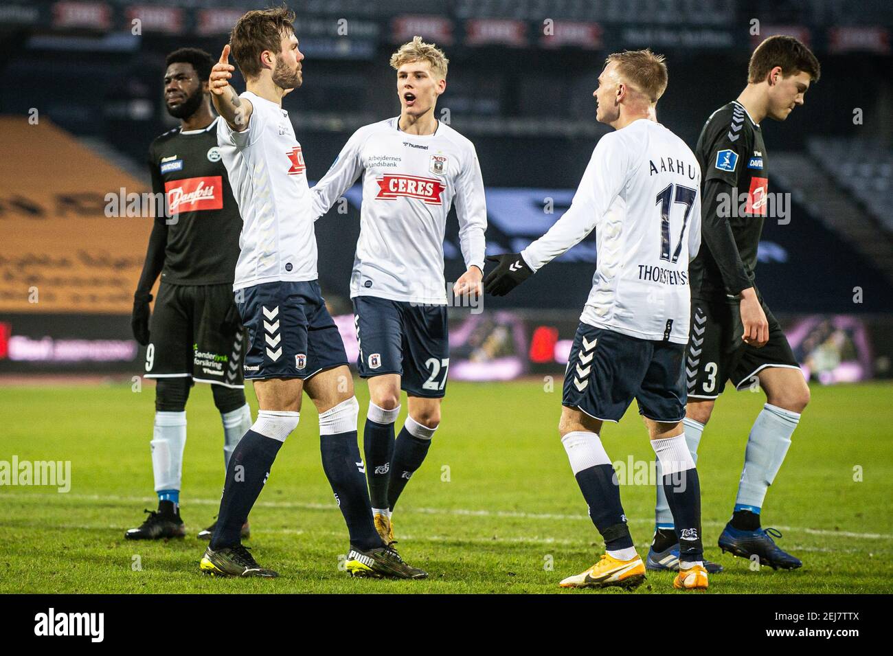 Aarhus, Denmark. 21st Feb, 2021. Patrick Mortensen (9) of AGF scores for 1-0 from the penalty spot and celebrates with Jon Thorsteinsson (17) and Albert Gronbaek (27) during the 3F Superliga match between Aarhus GF and Soenderjyske at Ceres Park in Aarhus. (Photo Credit: Gonzales Photo/Alamy Live News Stock Photo
