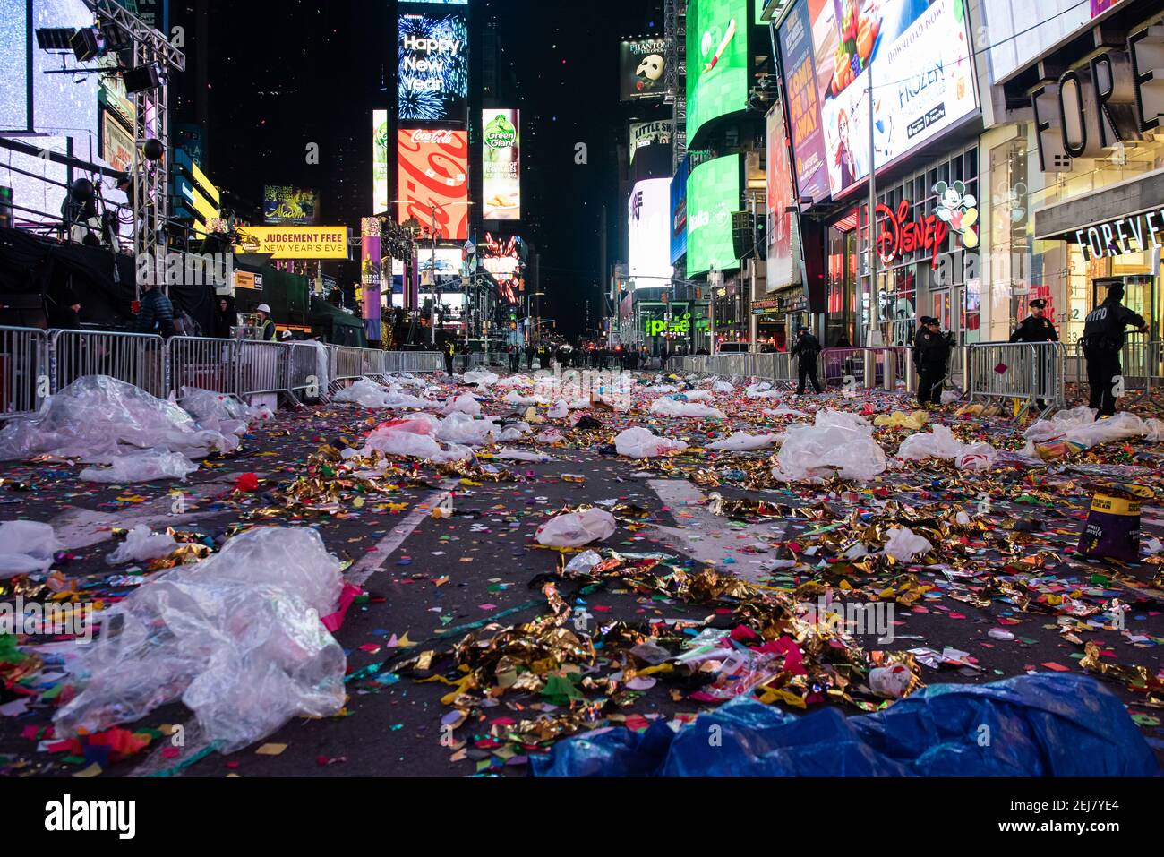 Times Square is covered in confetti and trash after the New Year's Eve