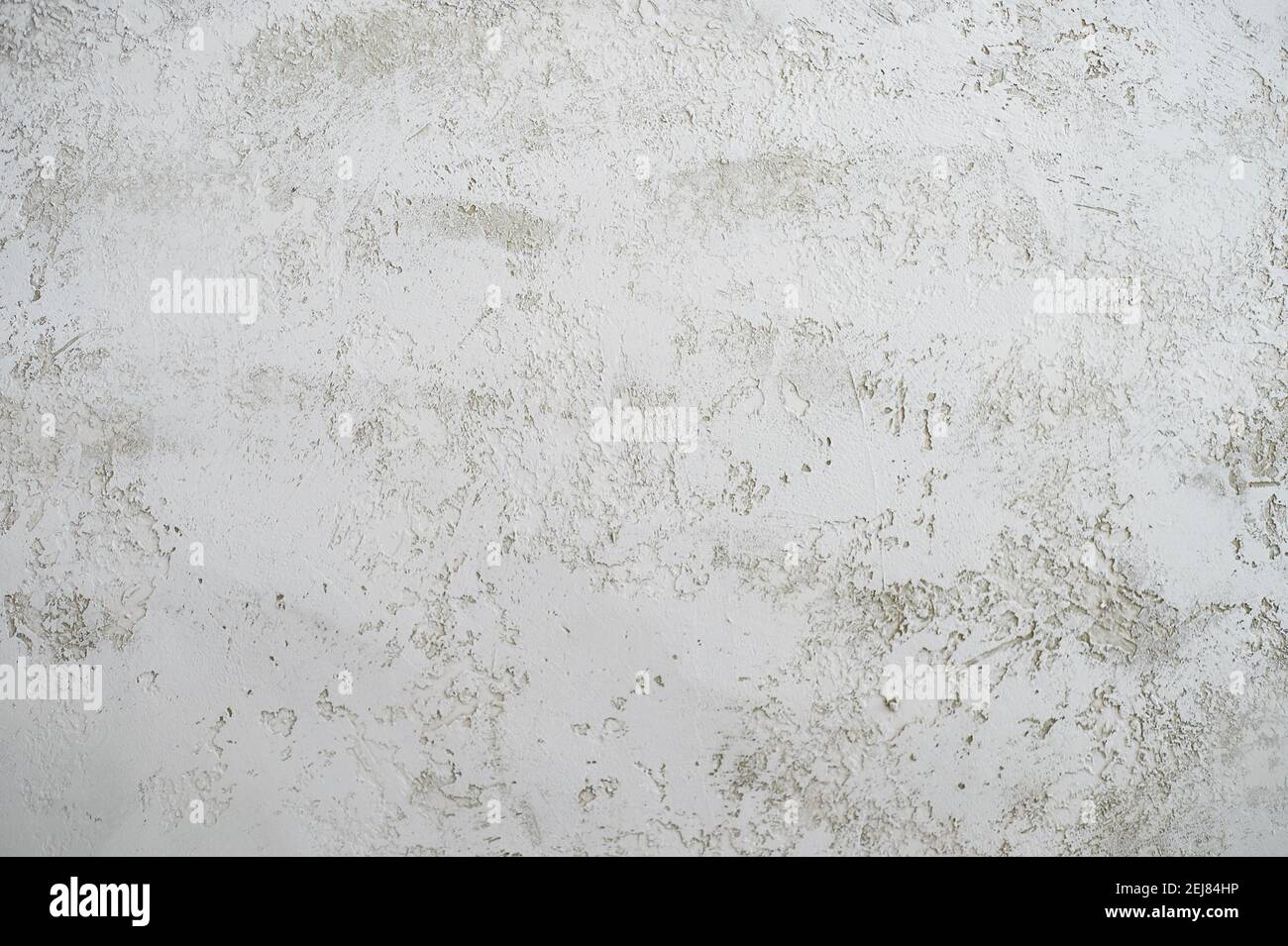 Grey textured wall with decorative plaster. Texture with space for text Stock Photo