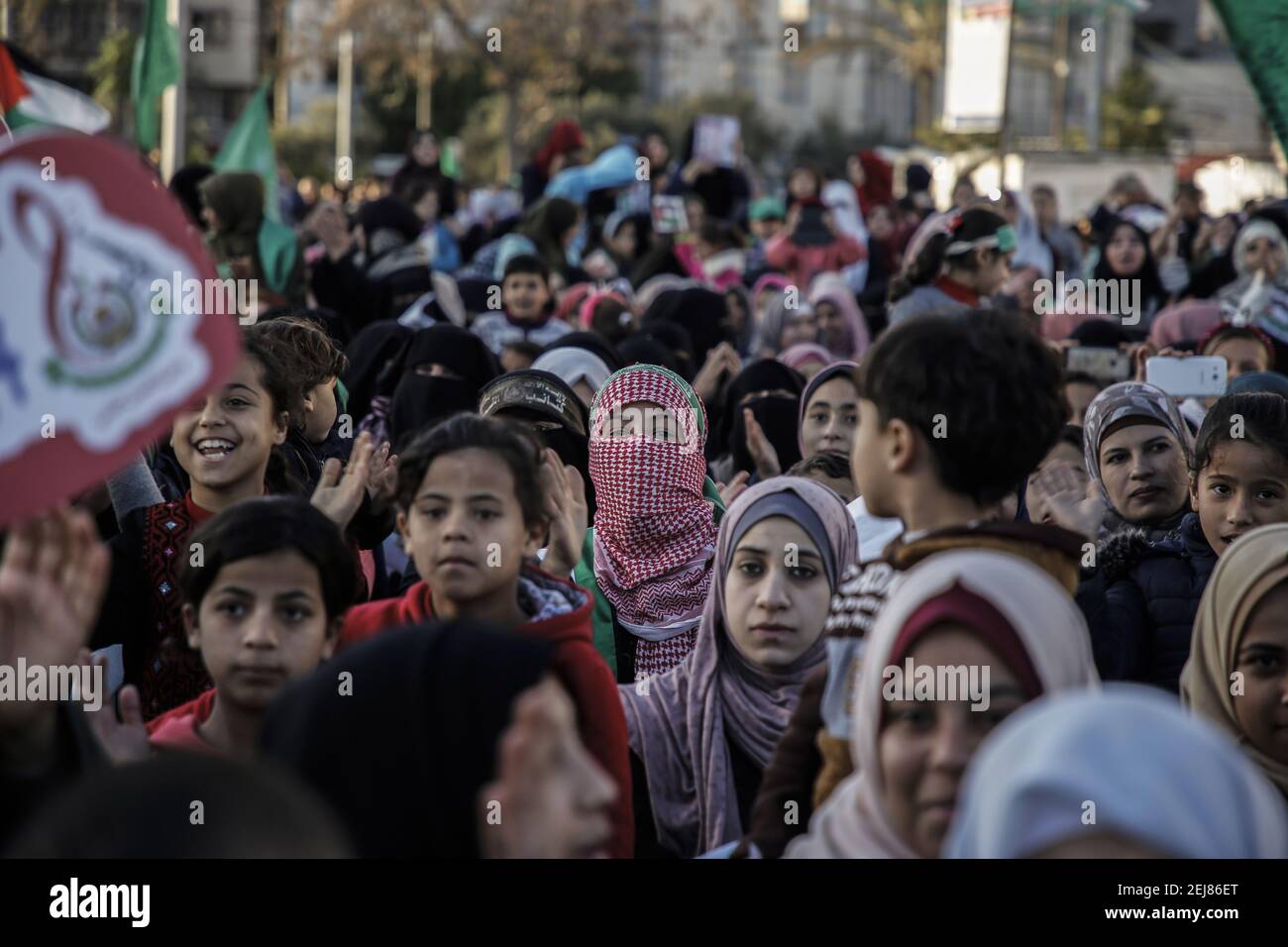 A masked Palestinian protester during a protest in solidarity with the ...