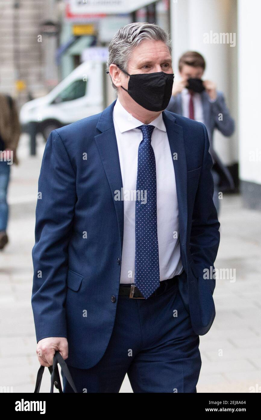 Sir Keir Starmer wearing a mask, leaves LBC's radio studio in Leicester Square, CENTRAL London Stock Photo
