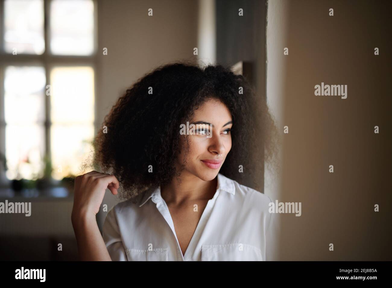 Young woman feeling beautiful hi-res stock photography and images - Alamy