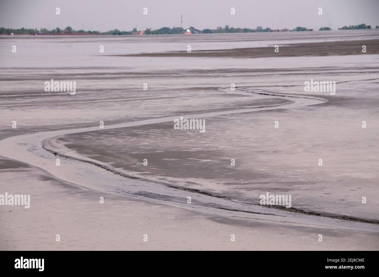 Channels in mud lake from environmental disaster which developed after drilling incident, Porong Sidoarjo, near Surabaya, East Java, Indonesia Stock Photo