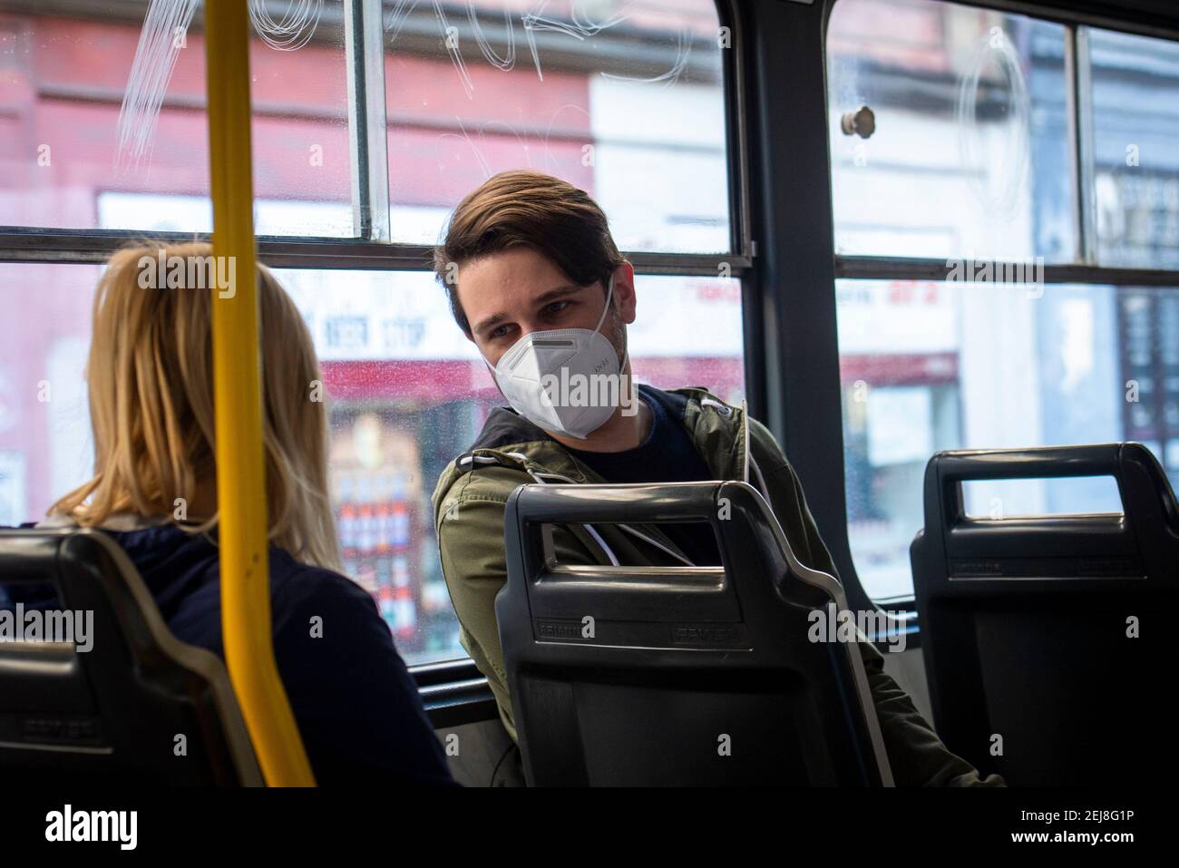 Prague, Czech Republic. 20th Feb, 2021. People with respirators in public transport, on Saturday, February 20, 2021, in Prague, Czech Republic. Health Ministry orders wearing of respirators, nano masks or two surgical face masks in shops, public transport and other public places from Monday, February 22. Credit: Katerina Sulova/CTK Photo/Alamy Live News Stock Photo