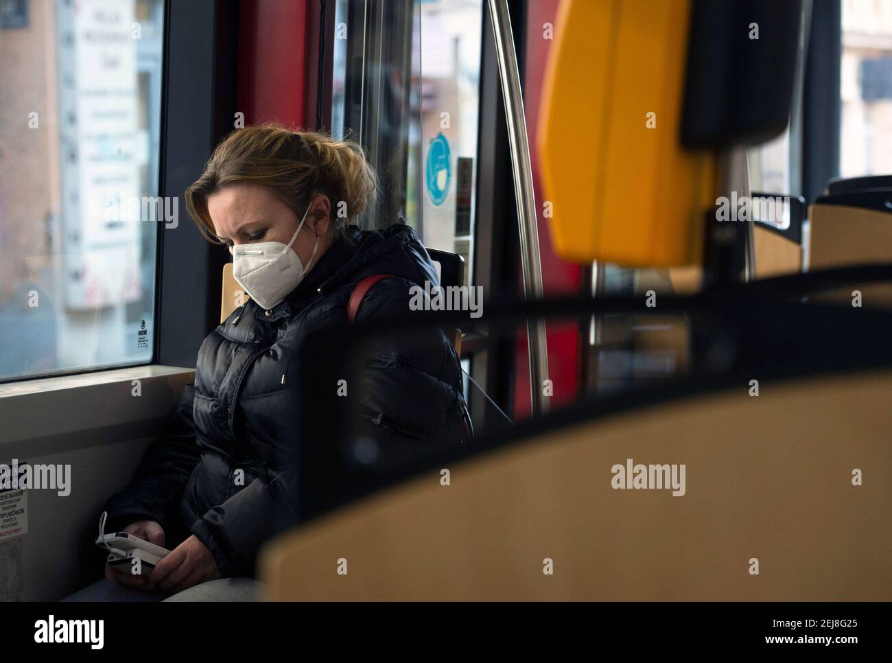 Prague, Czech Republic. 20th Feb, 2021. People with respirators in public transport, on Saturday, February 20, 2021, in Prague, Czech Republic. Health Ministry orders wearing of respirators, nano masks or two surgical face masks in shops, public transport and other public places from Monday, February 22. Credit: Katerina Sulova/CTK Photo/Alamy Live News Stock Photo