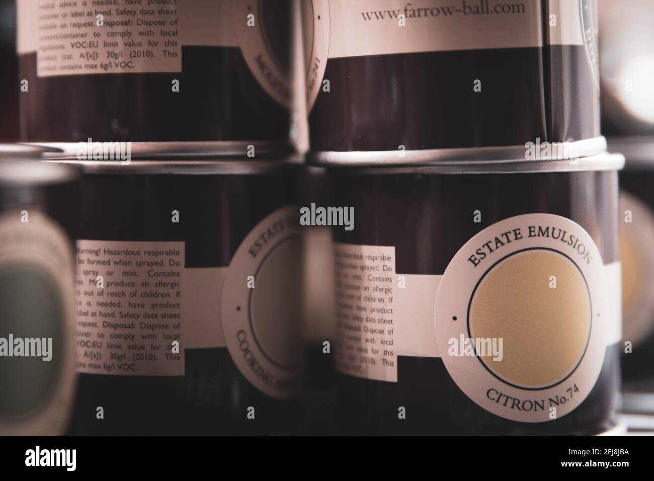 Sample pots of the premium pain Farrow and Ball arranged for use at home for DIY projects