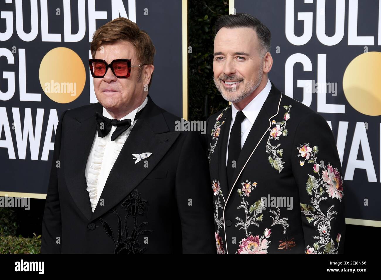 David Furnish and Elton John arrives at the 77th Golden Globe Awards