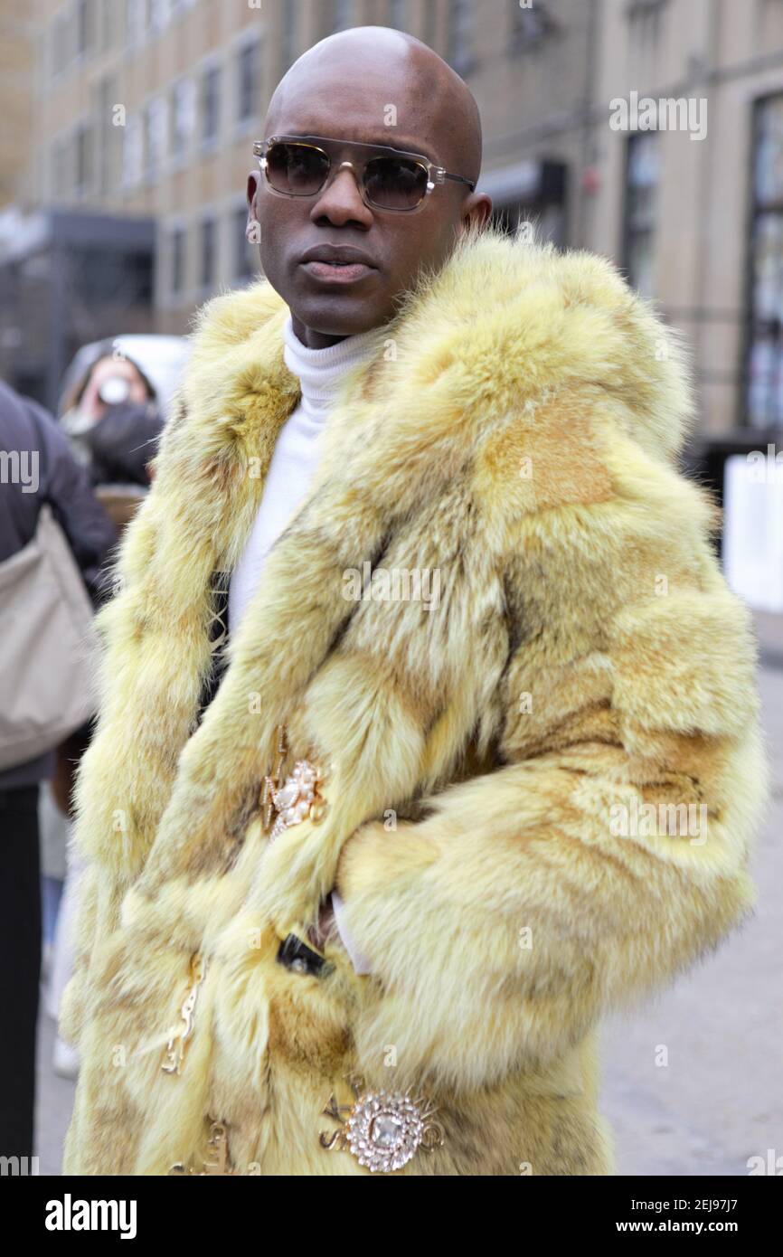 A gentleman seen wearing a yellow fluffy faux fur winter coat during London  Fashion Week Men's January 2020. (Photo by Pietro Recchia / SOPA  Images/Sipa USA Stock Photo - Alamy