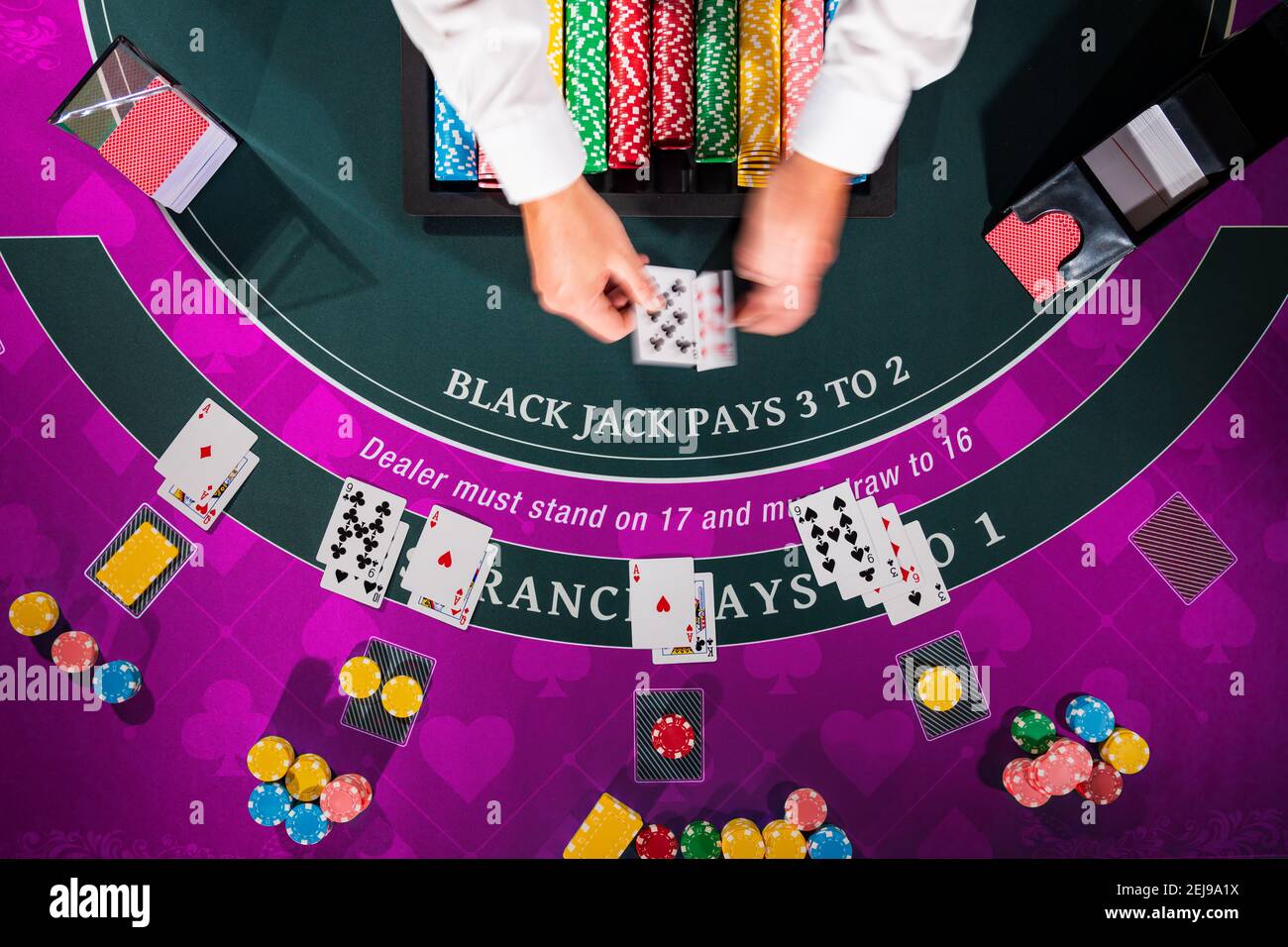 Overhead view with dealer hands of a Casino Black Jack table Stock Photo