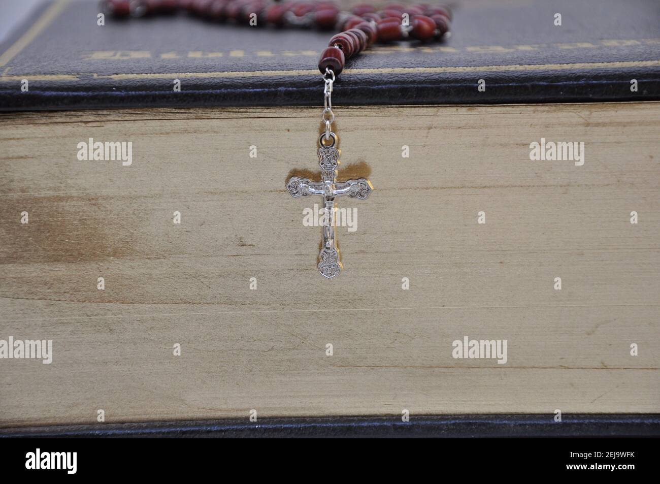 Holy Bible, special edition, with golden leaves, with silver crucifix placed on the side, crucifix with red third, photo zoom, Brazil, South America Stock Photo