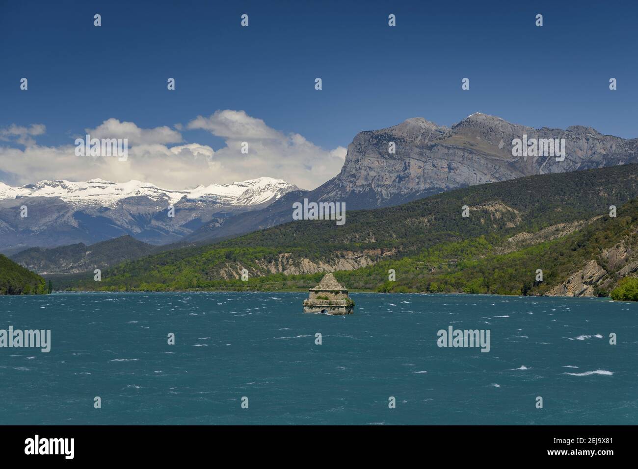 View of Sobrarbe (Aragon region) and Peña Montañesa from the Mediano reservoir (Aragon, Spain, Pyrenees) Stock Photo