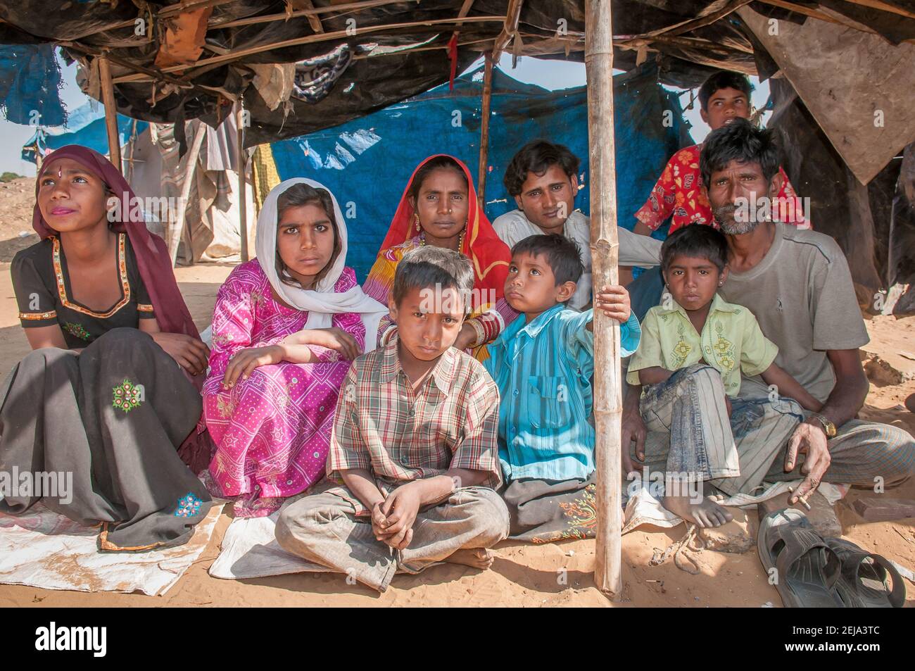 Rajasthan. India. 07-02-2018.Family in their humble dwelling in rural community. Specially low caste people suffer from extreme poverty and luck of op Stock Photo