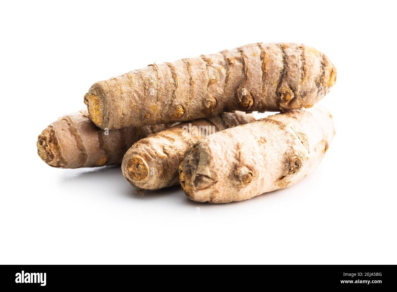 Indian turmeric root. Turmeric spice. Yellow turmeric isolated on white